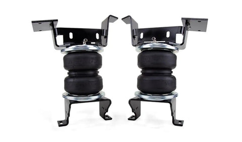 Air Lift LoadLifter 5000 Air Spring Kit components for Chevy Silverado and GMC Sierra, two black air springs with brackets.