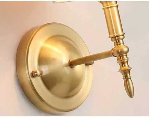 Close-up of Dope Warm Brass Wall Lamp With White Drum Shade, Hardwired Sconce For Bedside And Hallway, Modern European Style Lighting