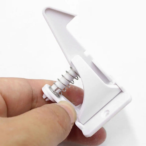 Close-up of white ABS cabinet lock from 16 Pack Cabinet Locks For Childproofing Cabinets And Drawers Easy Install ABS Material