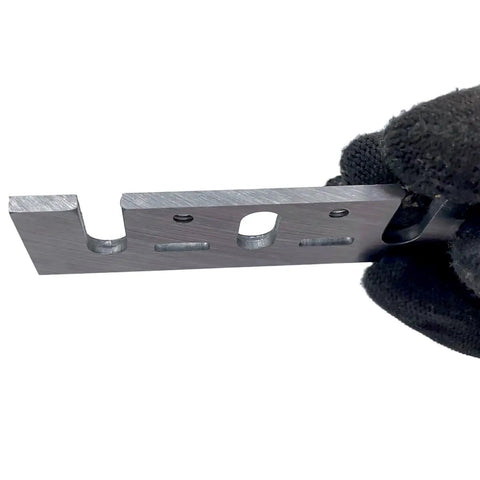 Top Shelf HSS Planer Blades Set Of Eight Heavy Duty Hand Planer Replacement Knives Built Tough For The Woodworking Shop Boasts Crisp Cuts Every Single Time For Reliable 3 1 4 Inch Model Compatibility, showing a close-up of a professional-grade steel knife.