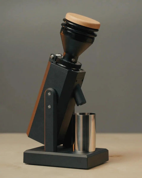 Dope Stepless Coffee Grinder Featuring 40mm Stainless Steel Conical Burrs For Pulling Consistent Espresso Shots And Brewing Smooth Daily Drips With Hella Low Retention In Matte Black, side profile view.