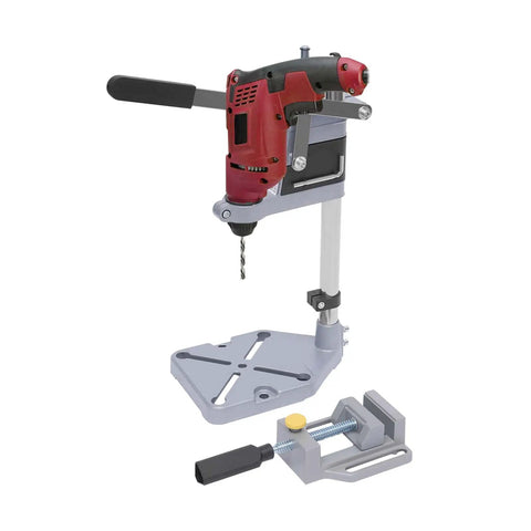 Portable Drill Press Stand And Hand Drill Adapter Aluminum Base Single Hole Workstation For Precise Drilling Workshop Table And Repair Projects Pro Grade Durable And Stable For Accurate Holes And Clean Cuts In Wood And Metal, featuring a red and black drill.