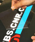 Applying Clear Contact Paper 17.7 Inch Wide 118 Inch Long Peel And Stick Self Adhesive Vinyl For Cricut Transfers on a black surface