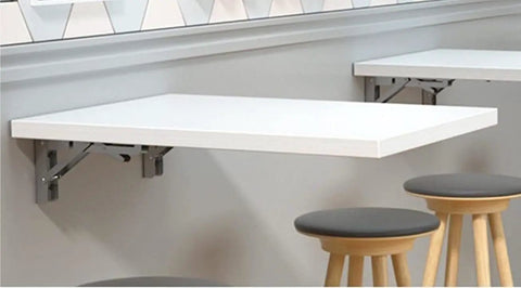 Heavy Duty Rock Solid Folding Wall Mount Shelf Brackets Crafted From Premium Stainless Steel With A Durable Matte Black Coating for a white shelf in kitchen.