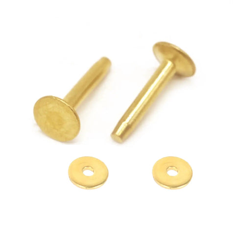 Fifty Pack Dang Solid Brass Stud Rivets And Flat Washers Size 12 Three Quarter Inch Long Tough As Nails hardware for leather crafting, displaying two brass rivets and two washers.