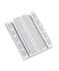400 Tie Point Breadboard With Dual Power Rails For Jumper Wires Three Pack White PP Plastic Body With Black Legend And Color Distribution Strips Self Adhesive Backing For Easy Mount On Prototyping Shields And DIY Electronics Projects, angled view