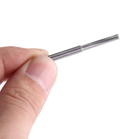 Get A Bang For Your Buck With This 10 Pack Of 3.175mm Tungsten Carbide End Milling Cutters Perfect For CNC Woodworking And Engrave Jobs That Need Durable Double Flute Bits: Hand holding a 3.175mm tungsten carbide end milling cutter.
