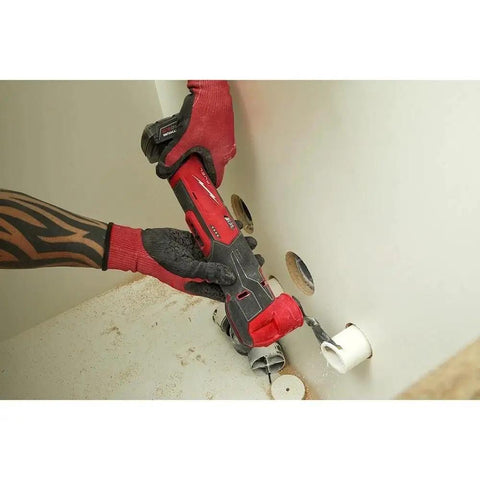 Badass Brushless 12V Oscillating Multi Tool Full Setup Kit With Heavy Duty Battery Fast Charger and Sturdy Cutting Accessories in action cutting.