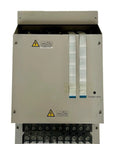 Kickass 30 KW Electric Vehicle Inverter For EV Power Conversion With Slick Design And Proven Efficiency That Delivers Gutsy Output And Bulletproof Reliability For City Commuting And Heavy Duty Loads, gray metal housing with connectors.