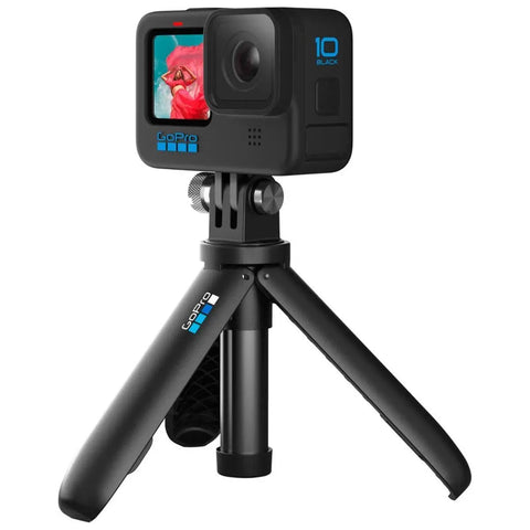 HERO10 Black Must Have Accessory Bundle With Shorty Mini Extension Pole And Grip Magnetic Swivel Clip Two Rechargeable Batteries And Durable Camera Case For Action Cameras on tripod