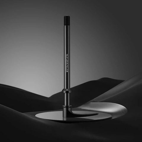 Thru Axle Adapter For Boost Forks, 1.0mm Thread Pitch, shown with a black finish, against a dark backdrop.