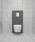 Essentials Toilet Brush Set With StarLight Chrome Finish next to a modern toilet in a grey tiled bathroom.