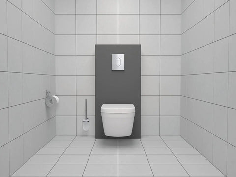Essentials Toilet Brush Set With StarLight Chrome Finish next to a modern toilet in a grey tiled bathroom.