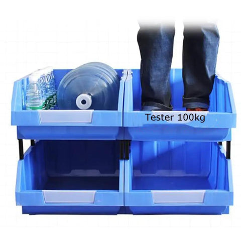 Hella Rugged Wall Mounted Storage Rack Featuring Thirty Bright Plastic Bins For Garage Tool Sorting Screws Nuts Bolts Small Hardware Parts Fast Assembly No Sweat Organization Daily with blue bins and person standing on top.