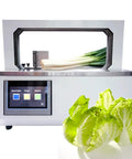 Rock Solid Heavy Duty Automatic Strapping Machine With 4.5 Inch Touch Screen, featuring leeks and lettuce for efficient food packing.