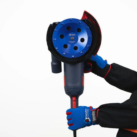 Person holds power tool with Beast Mode 7 Inch 12 Segment Quarter Round PCD Concrete Grinding Cup Wheel With Threaded Shank