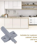 Heavy Duty Magnetic Cabinet Door Catches With Built In Buffer Stopper, grey ABS catch in modern kitchen setting.