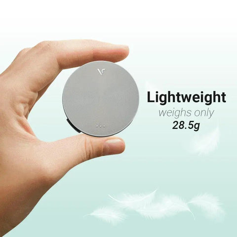 Hand holding a lightweight GPS Golf Range Finder With Voice Yardage Output Auto Slope And Active Green Info On 40K Courses Eight Hour Battery.