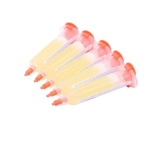 Six syringes of No Clean Flux Gel Paste for Soldering with Needle Dispensing Tool 559 ASM, arranged in a fanned pattern.
