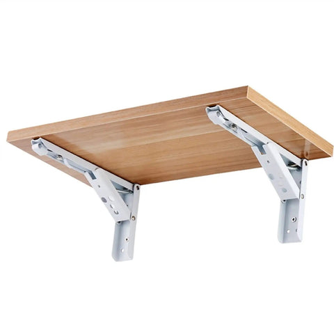 Slick Fold Away Corner Brackets For Wall Shelves And Tables Heavy Duty Support With No Sweat Screw Setup Straight Up Easy Hidden Triangle Mount White 14 Inch Pair holding a wooden shelf.