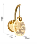 Modern LED Wall Sconce With Crystal Accent For Bedroom And Bathroom Easy Quick Install Delivers Wide Range Soft Illumination No Sweat Mount Straight Fire Decor Upgrade, gold finish with glass oval detail.