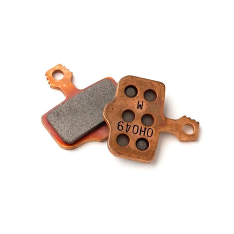 Beefy Sintered Disc Brake Pads For SRAM Avid Elixir And Level Series Fit, showing steel-backed durability and sintered material for trails.