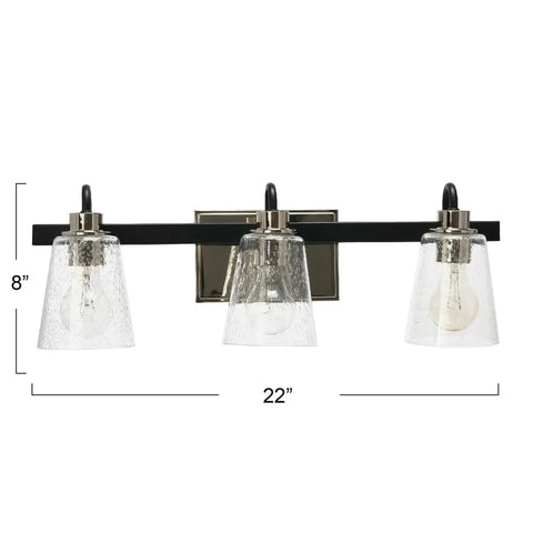 Three Light Vanity Fixture With Seeded Glass Diffusers Matte Black Finish With Polished Nickel Accents Sleek Industrial Vibe