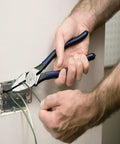 Using 9 Inch High Leverage Linesman Pliers For Copper Aluminum And Soft Metals, cutting wire in an electrical box
