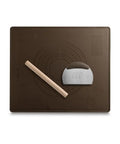 Silicone baking mat with rolling pin and dough cutter on a white background