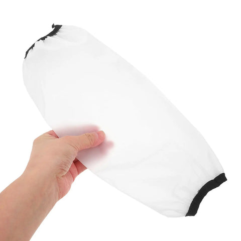 Heavy Duty Waterproof Arm Sleeves For Adults Built Tough And Oil Resistant Elastic Long Arm Guards held in hand, transparent material.