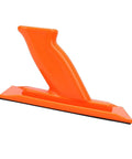 Heavy Duty Non Slip Woodworking Push Block And Safety Push Stick With Ergonomic Tilted Handle Is A Total Kickback Buster in bright orange.
