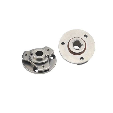 Pair of hollow-disc torque hinges; side and front views in stainless steel mounting flanges for industrial electrical equipment.