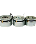 Front view: three silver electromagnetic brake motors with round metal housings and wiring.