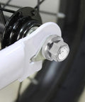 Front bike wheel with Six Pack Flanged Wheel Hub Nuts For Front And Rear Bikes Includes M8 Three Eighths Inch And M10 Sizing Great For Mountain And Kids Bikes Chrome Plated Steel With Anti Slip Pattern That Helps Prevent Loosening on axle.