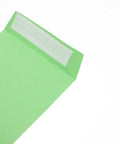 60 Pack Green Kraft Paper Coin Envelopes Self Seal With Double Adhesive, showcasing adhesive strip on flap.