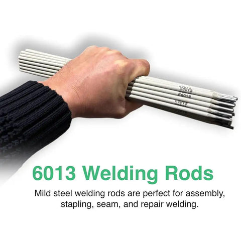Hand holding 6013 welding rods, suitable for Pro Grade Stainless Steel Welding Rod For Repair And Fabrication, Extra Fine, Low Spatter Filler Metal, High Temp Oxidation Resistance, Titanium Calcium Or Low Hydrogen Sodium Coating, For AC And DC Welders, 1.2mm And 3.2mm, 1kg, 350mm.