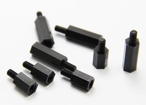 Top Tier M3 Hex Male To Female Nylon Standoffs Bulk Crate Of 50 Black Polymer Spacer Blocks, various sizes on white background.