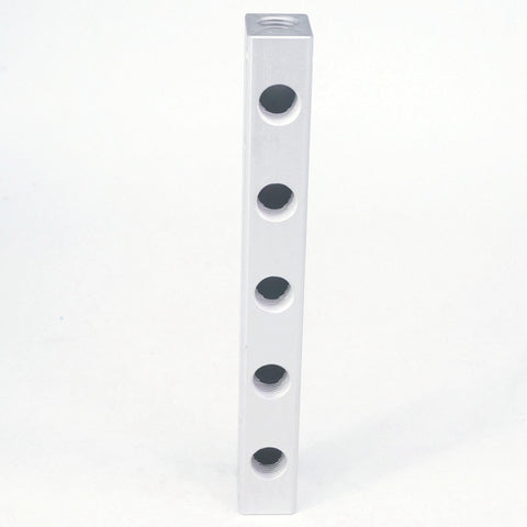 G1 4 Inch BSP Port Pneumatic Manifold Block standing vertically, 5 Way 7 Port Aluminum Splitter, solid aluminum construction