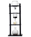 Smooth Operator Cold Brew Coffee Maker Featuring Slow Ice Drip Method For Bold Iced Coffee Flavors Large Capacity Tower with natural wood stand and thermal glass.
