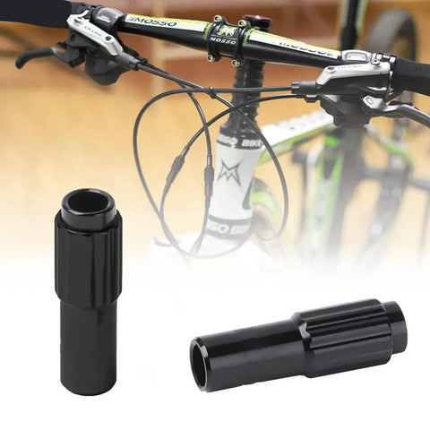 Four Pack Aluminum Alloy Bike Cable Adjusters For Brake And Gear Shift CNC Machined Shifter Cable Adjusters Compatible With 4mm And 5mm Derailleur Speed Screws, black, shown with bike handlebar.