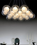Polished Chrome And Distinctive Glass Pendant Ceiling Light With Energy Efficient Led Bulbs That Brings Serious Style And Laid Back Vibes To Your Living Room Or Dining Spot, showcasing multiple glass globes.
