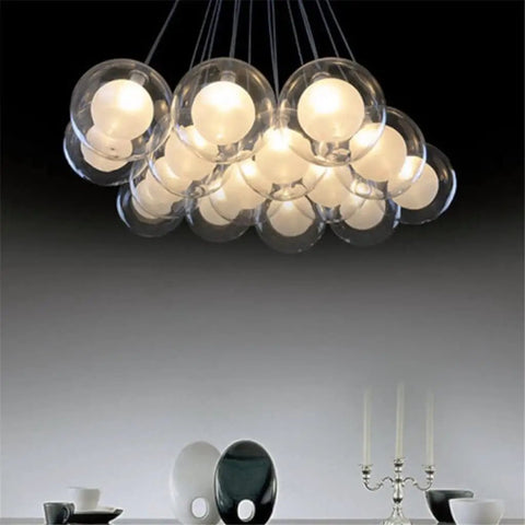 Drop Dead Stunning Modern Glass Pendant Chandelier With Polished Chrome Finish And Efficient Led G4 Bulbs. Glass globe design highlights ambiance.