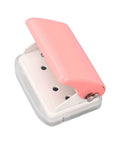 Ultimate Handheld 3-Hole Paper Puncher with 5-Sheet Capacity, Super Easy Alignment for Spot-On Holes, pink top view.