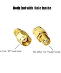 Two Eight Pack SMA Female To RP SMA Male RF Coaxial Adapters, shown with both ends visible, in gold, for antennas and wireless devices.