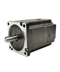 Front view of a black NEMA-34 size stepper motor with protruding shaft and mounting flange.
