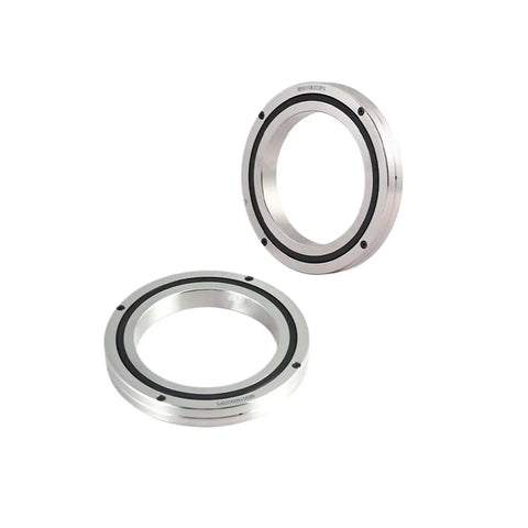 Precision Cross Roller Bearing For Robotic Rotary Tables Runs Like A Champ On Heavy Machinery And Gives You A Drop In Ready Upgrade. Two durable cross roller bearings showcasing a metallic finish.