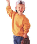 Smiling child using Kid Friendly Light Switch Extender Two Pack Fits All Standard Toggle Switches Made In USA