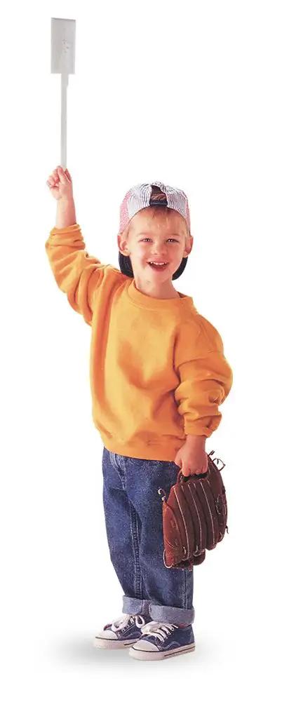 Smiling child using Kid Friendly Light Switch Extender Two Pack Fits All Standard Toggle Switches Made In USA