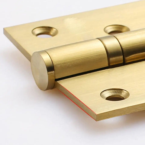 Close-up of a brass hinge, part of a Three Pack Soft Close Door Hinges For Cabinets And Closets, Thickened Quiet Flat Hinge with Free Slot.
