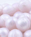 Premium Silicone Beads For Keychain Making And Jewelry Crafting Assorted Sizes With Hella Durable Build in soft pink.